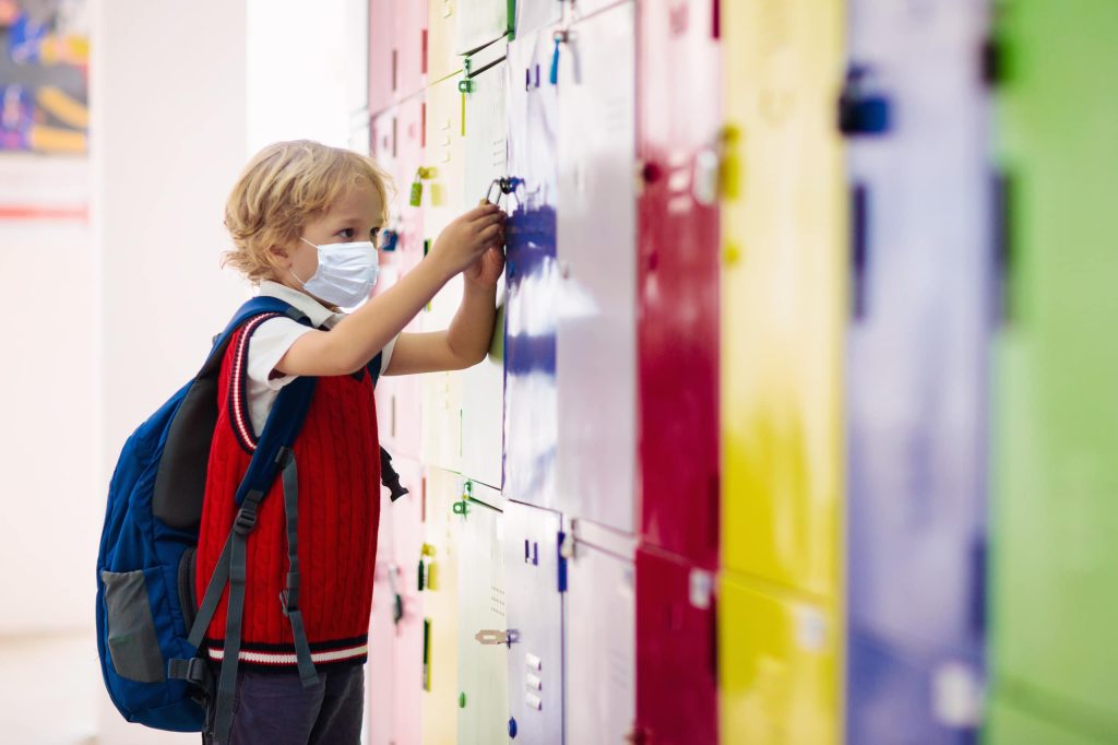 Image of kid opening a school lockers